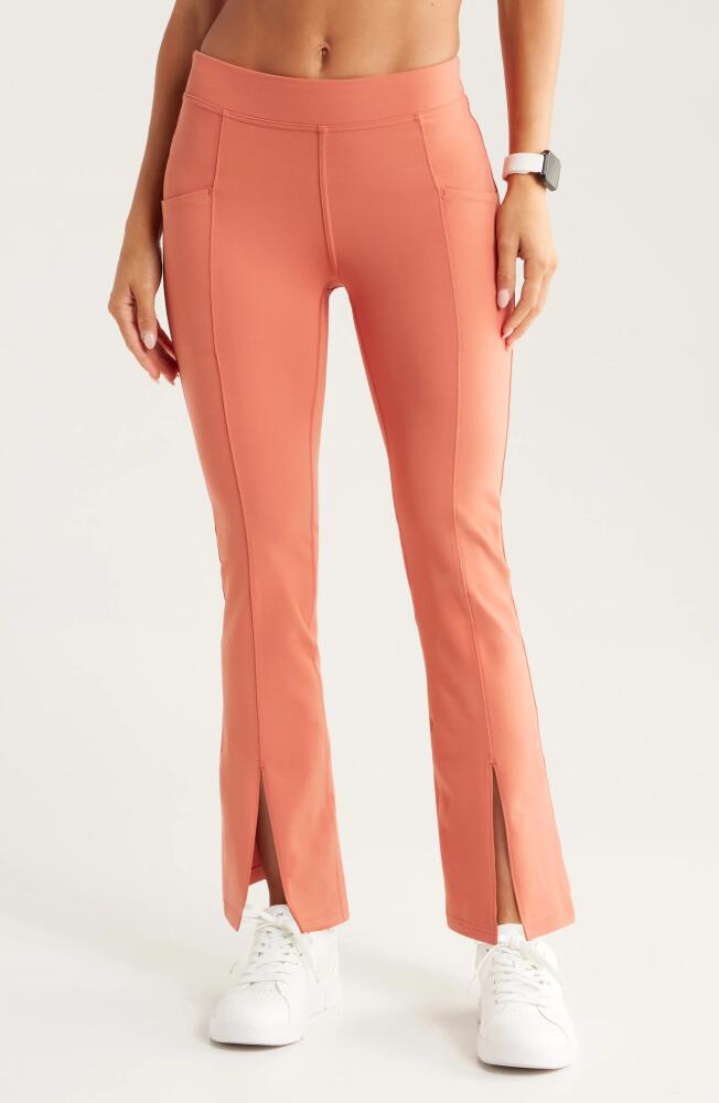 Zella High Waist Kick Flare Pocket Leggings in Rust Redwood Cover