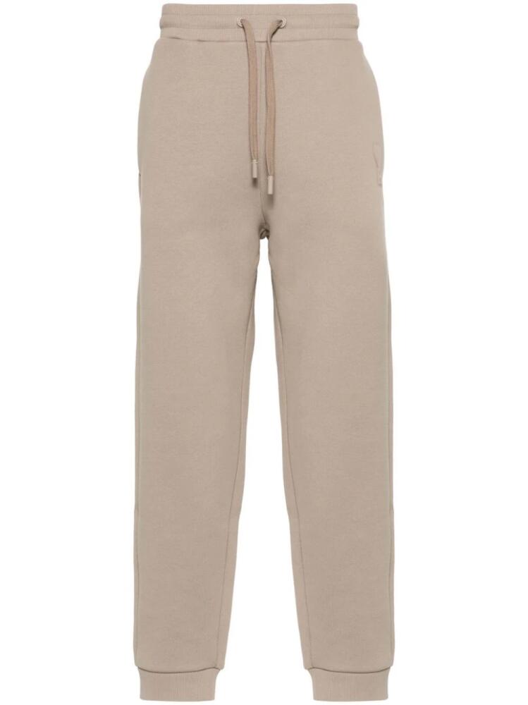 AMI Paris embossed-logo track pants - Neutrals Cover