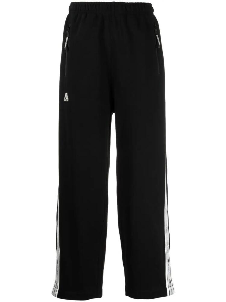 izzue logo-patch cotton-blend track pants - Black Cover