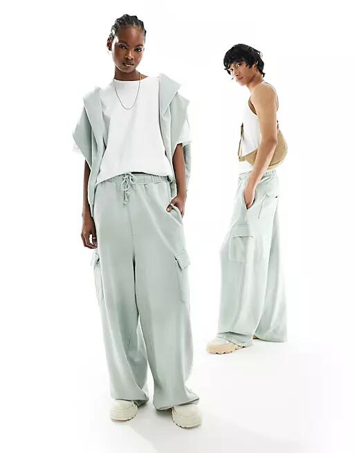 ASOS DESIGN unisex wide leg sweatpants with cargo pockets in washed green - part of a set Cover