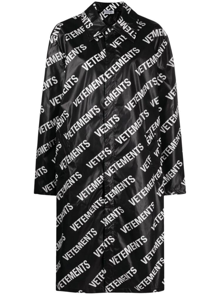 VETEMENTS logo-print mid-length coat - Black Cover