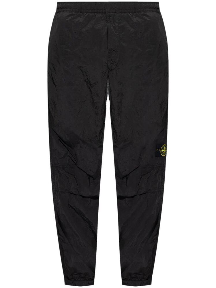 Stone Island logo-patch elasticated-waist track pants - Black Cover