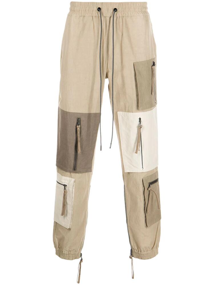 Mostly Heard Rarely Seen patchwork zip-pocket trousers - Brown Cover