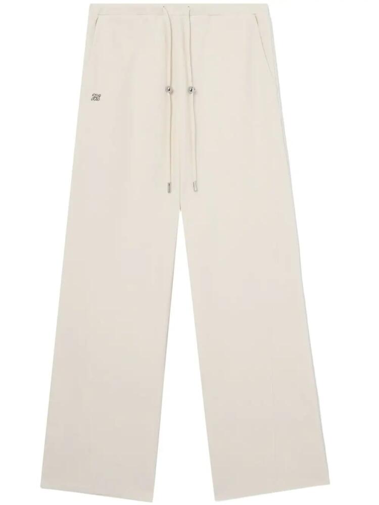 tout a coup logo-embroidered cotton track pants - Neutrals Cover