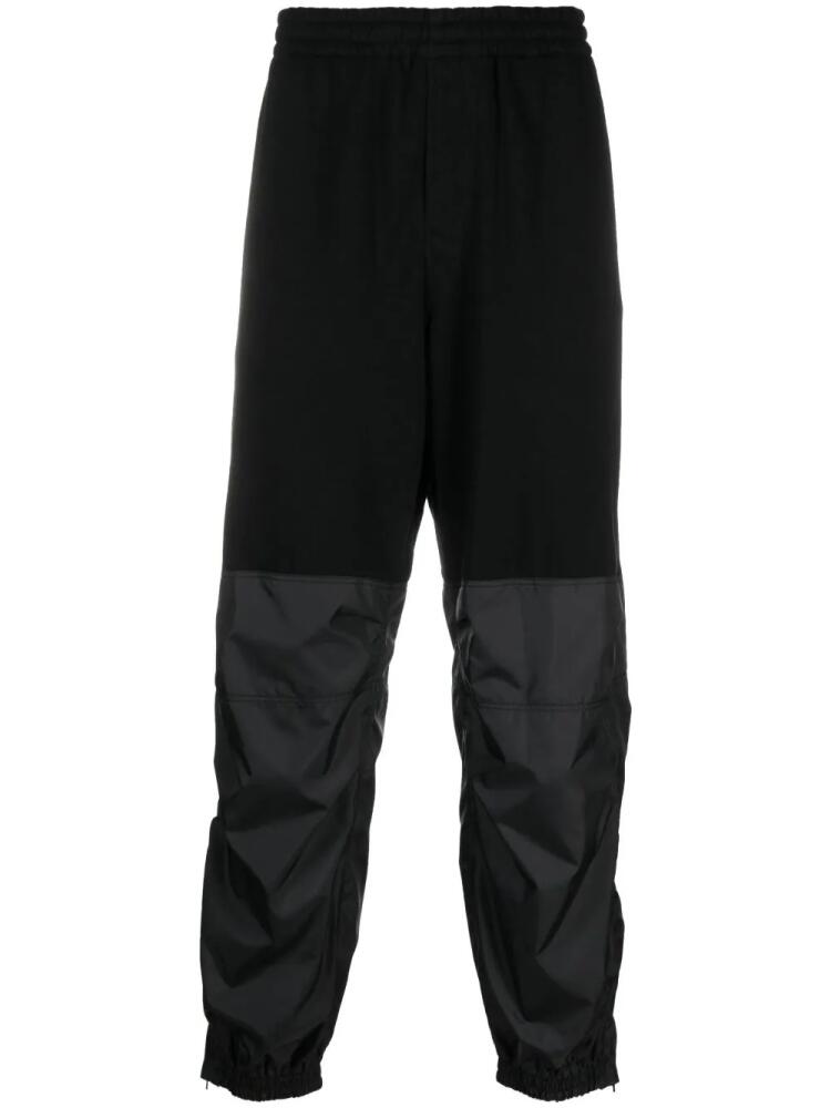 Undercover elastic-waist panelled track pants - Black Cover