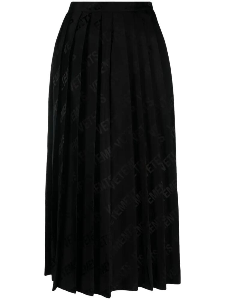 VETEMENTS logo-jacquard pleated midi skirt - Black Cover