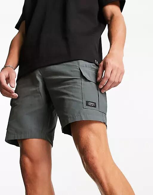 New Look nylon cargo shorts in green Cover