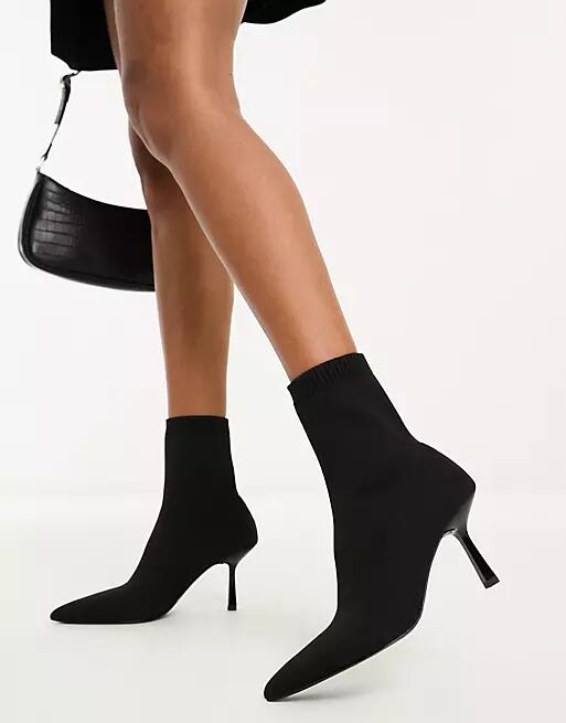 ASOS DESIGN Rosetta kitten heel sock boots in black Cover