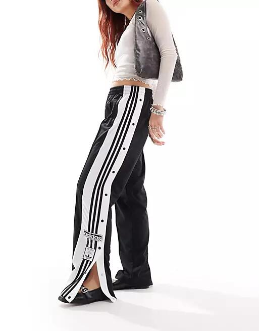 adidas Originals adicolor adibreak side logo track pants in black Cover