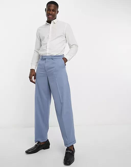 New Look relaxed pleat front pants in blue Cover