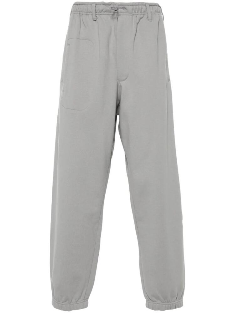 Y-3 toggle-fastening track pants - Grey Cover