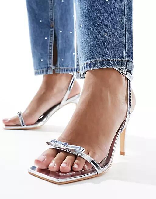 Glamorous bow barely there heeled sandals in silver Cover