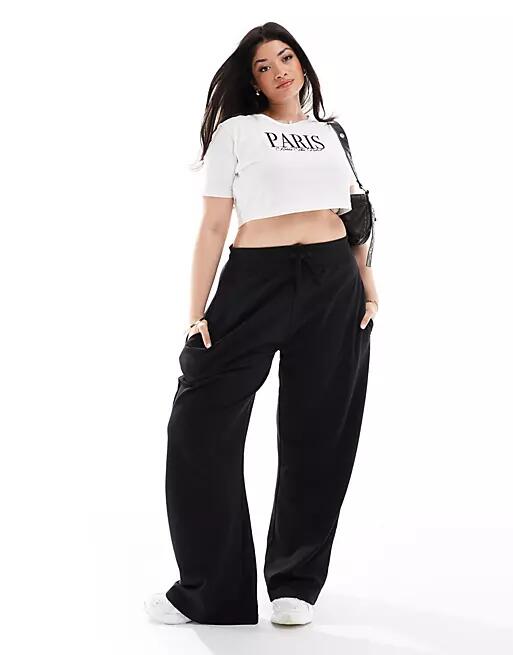 Kaiia Plus wide leg sweatpants in black Cover