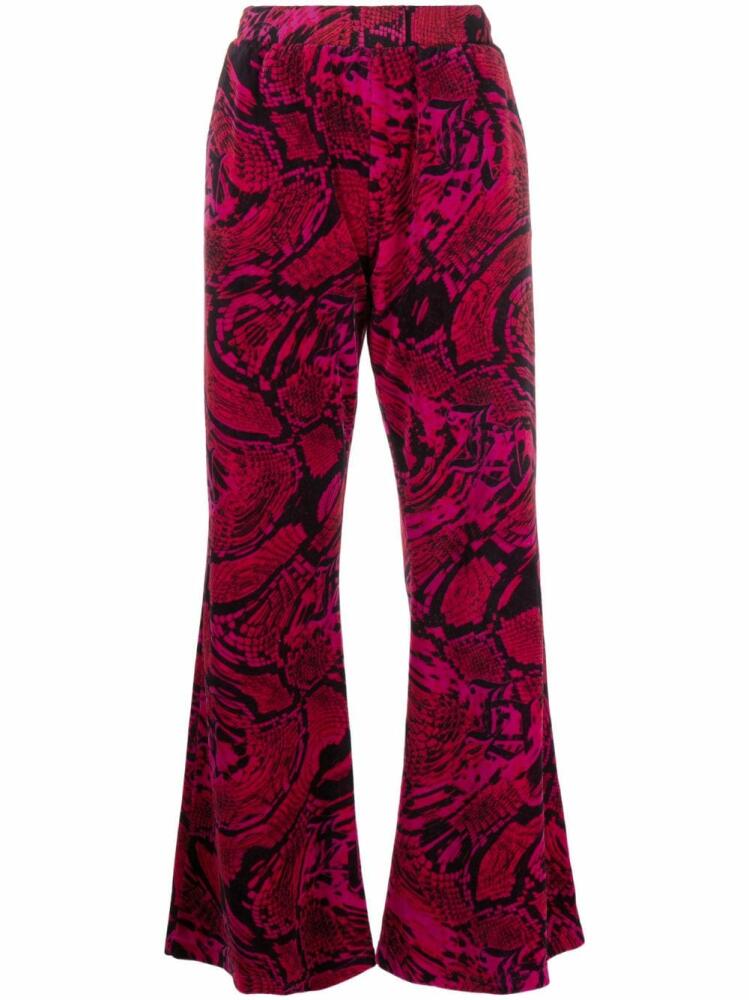 Aries snakeskin-print flared trousers - Pink Cover