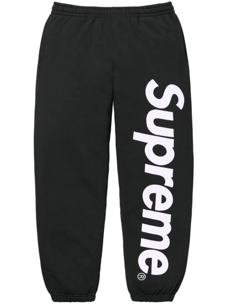 Supreme satin-appliqué cotton track pants - Black Cover