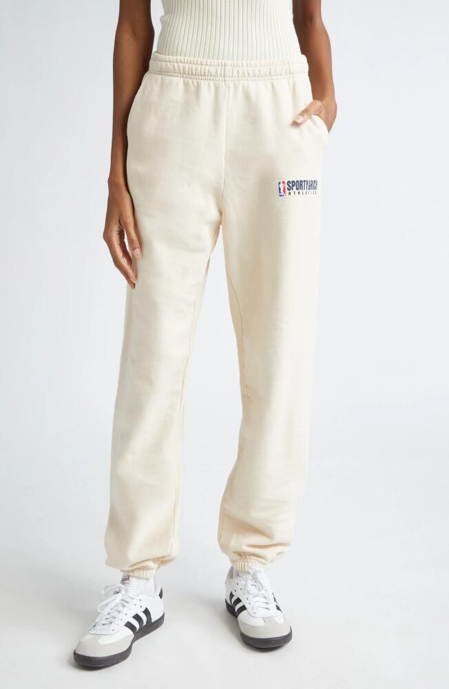 Sporty & Rich Team Logo Cotton Sweatpants in Cream Cover