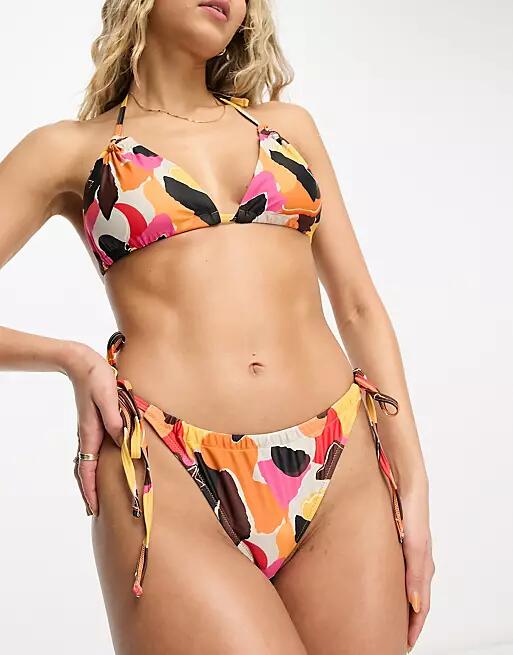 We Are We Wear melissa tie side bikini bottom in retro Paper Print-Multi Cover