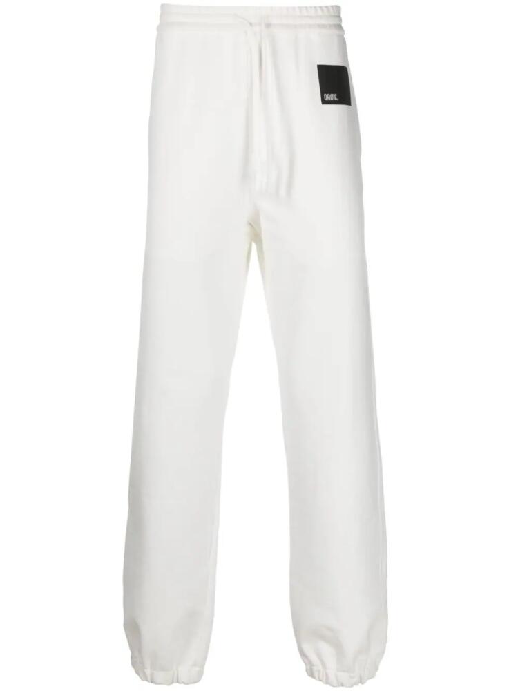 OAMC logo-patch cotton track pants - White Cover