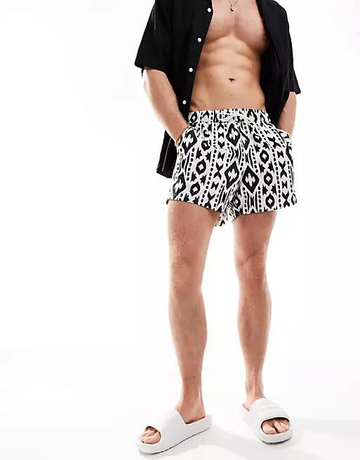 ASOS DESIGN swim shorts in mid length in swirl print-White Cover