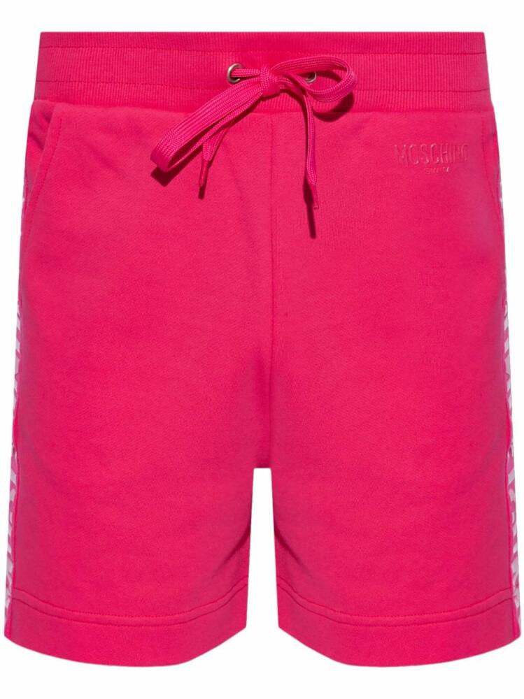 Moschino logo-embossed cotton beach shorts - Pink Cover