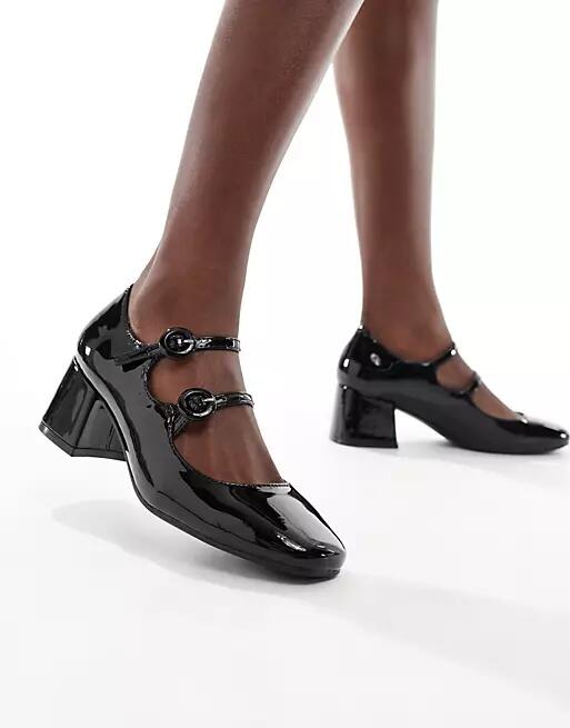 Glamorous heeled mary janes in black patent Cover