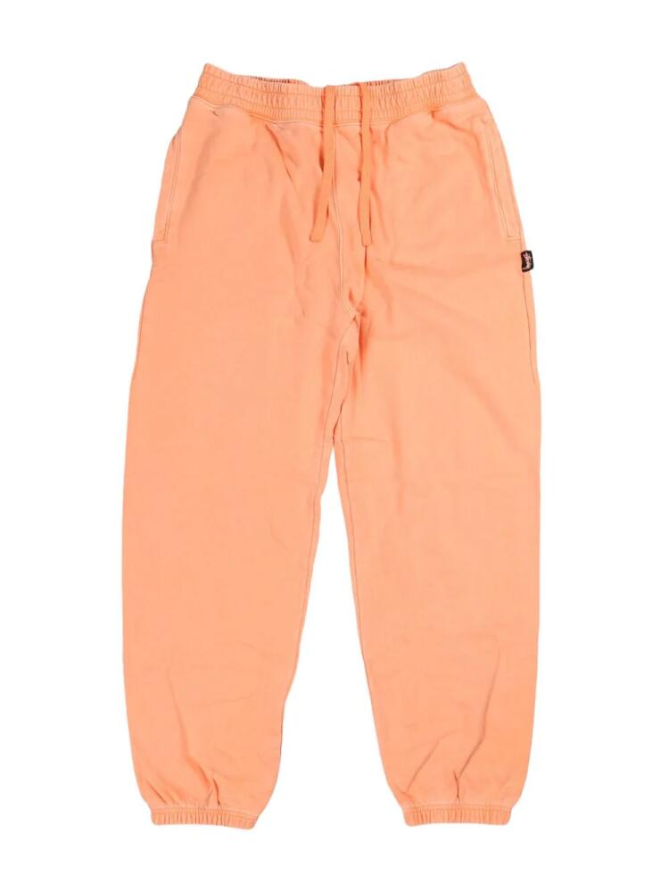 Stüssy logo-appliqué drawstring track pants - Orange Cover