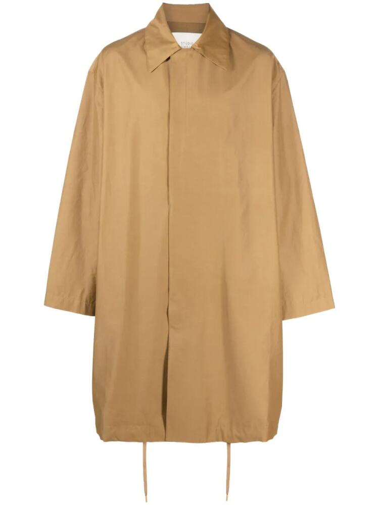 Studio Nicholson knee-length drawstring-hem coat - Brown Cover