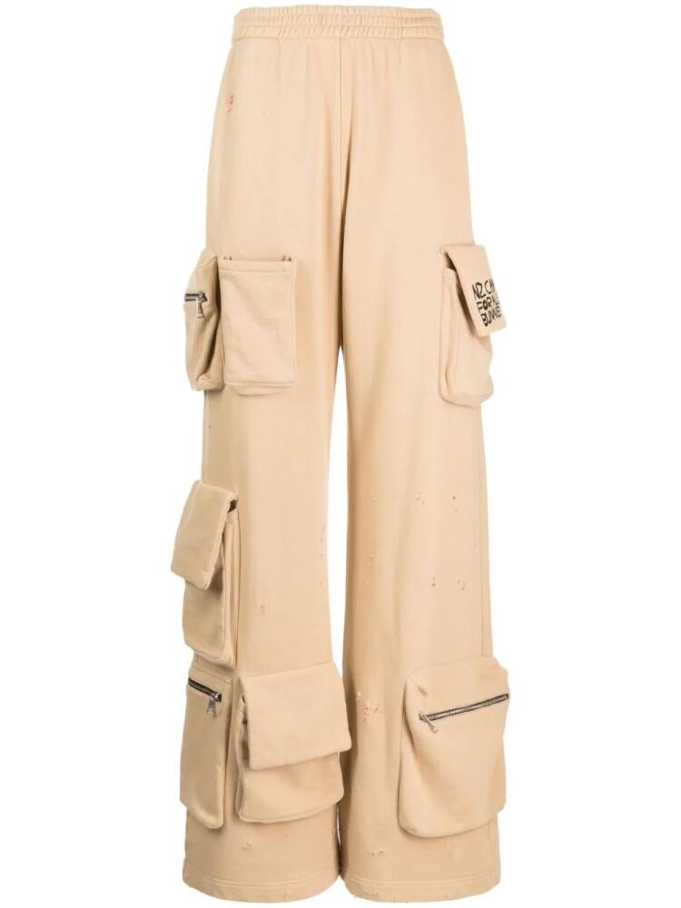 Natasha Zinko cargo-pocket track pants - Neutrals Cover