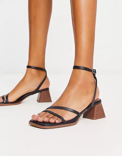 ASOS DESIGN Hastings mid block heeled sandals in black Cover