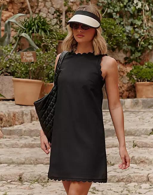 The Frolic x Lyds Butler llubi scallop edge mini beach dress in black Cover