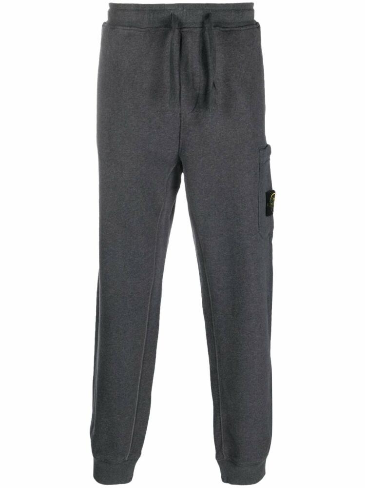 Stone Island Compass-motif cotton track pants - Grey Cover