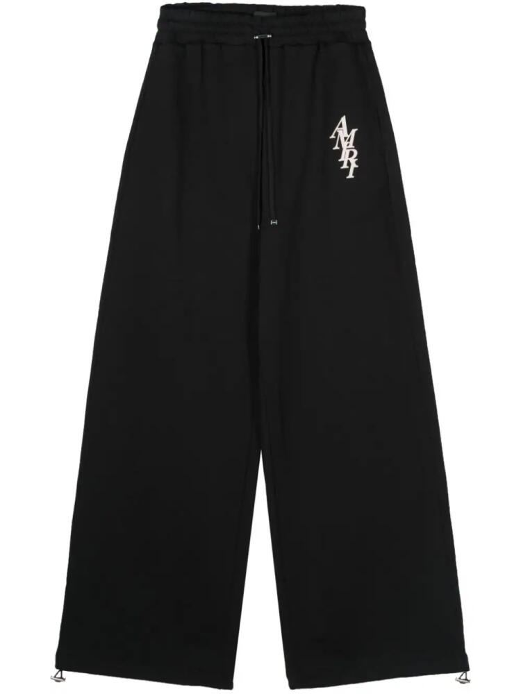 AMIRI logo-rubberised straight-leg track pants - Black Cover