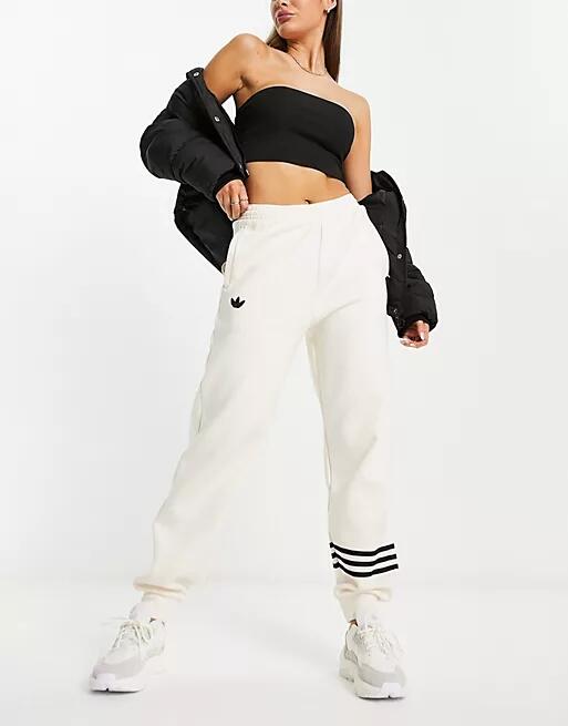 adidas Originals neuclassics track pants in off white Cover