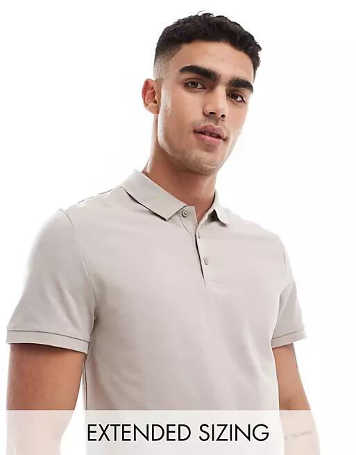 ASOS DESIGN pique polo shirt in stone-Neutral Cover