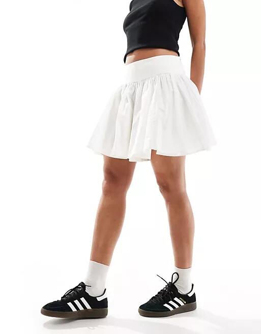 COLLUSION cotton flippy mini skirt in white Cover