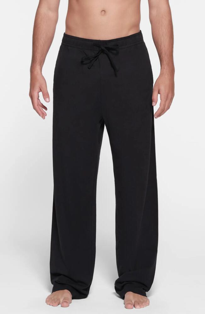 SKIMS Straight Leg Stretch Lounge Pants in Obsidian Cover