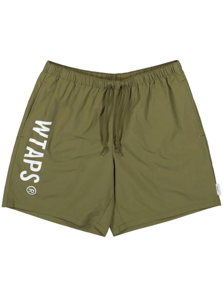 WTAPS elasticated logo-print shorts - Green Cover