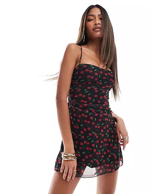 Bershka cowl neck lace up back mini dress in black cherry print Cover