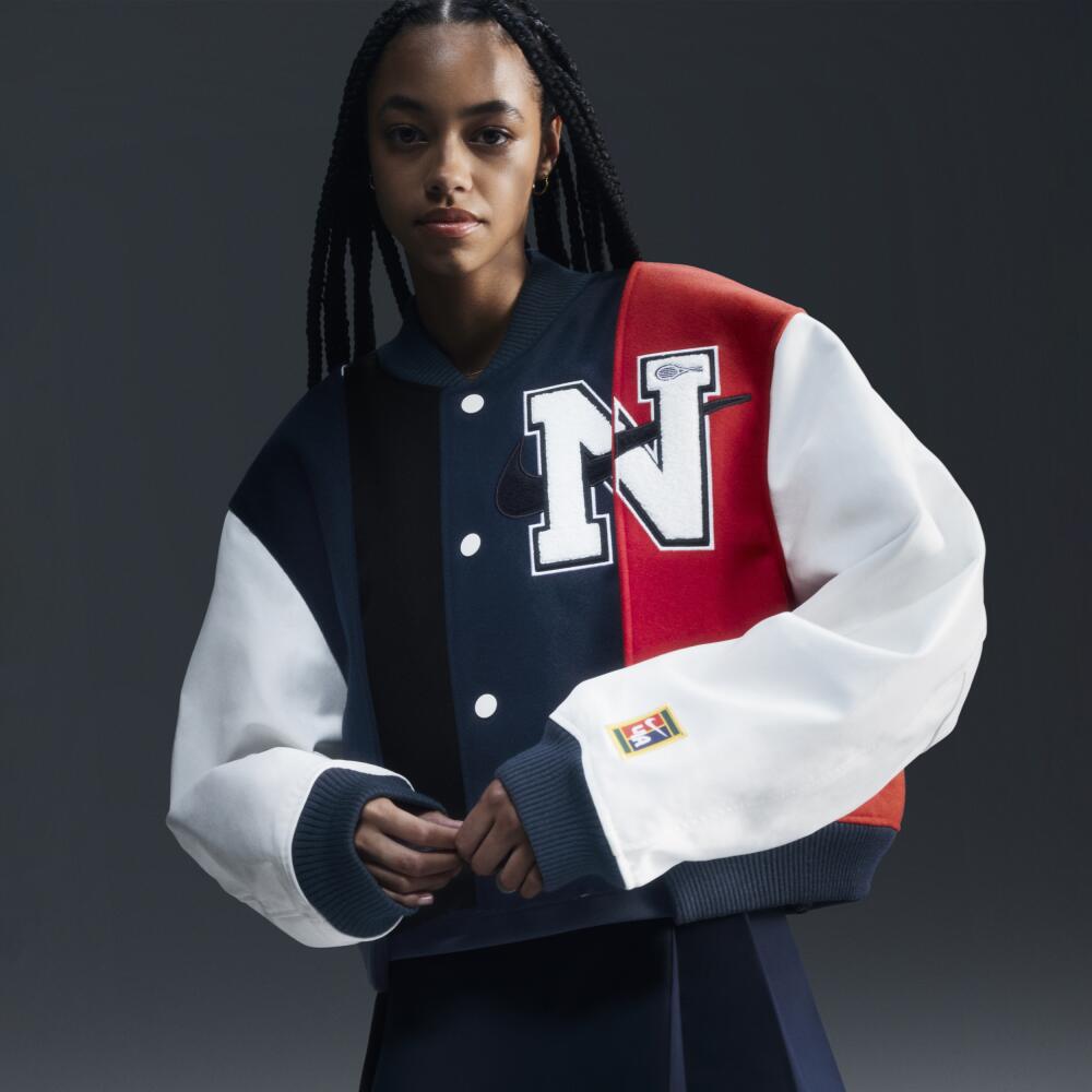 Nike Women's Women by YOON Oversized Varsity Jacket in Black Cover