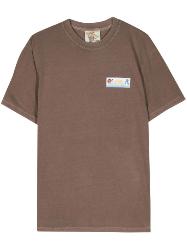 KidSuper Laundromat graphic-print T-shirt - Brown Cover