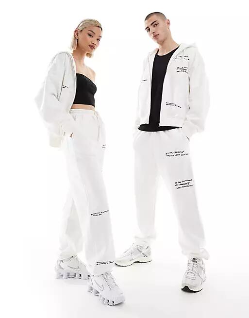 Weekday Unisex sweatpants with graphic embroidery in off-white - part of a set - Exclusive to ASOS Cover