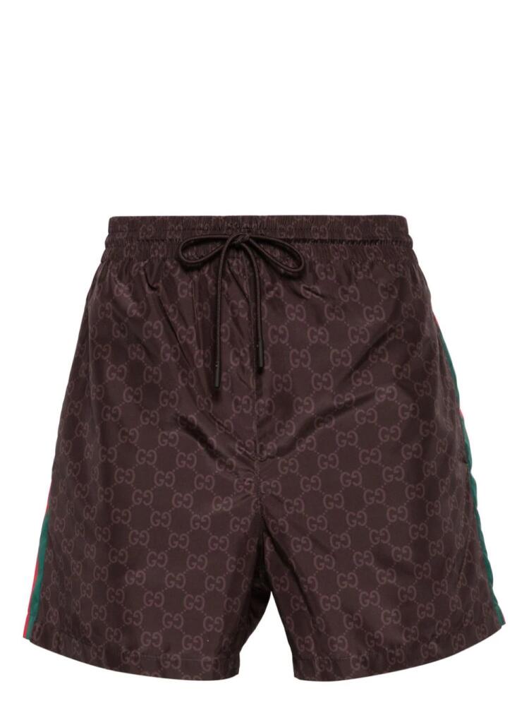 Gucci GG Supreme-print swim shorts - Brown Cover