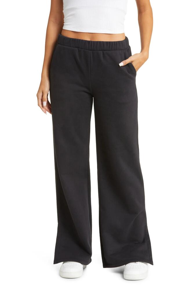 Beyond Yoga On The Go Wide Leg Flare Pants in Black Cover