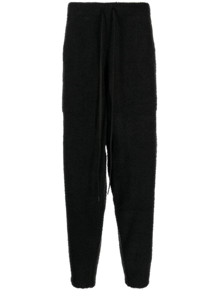 Mastermind World logo-print fleece-texture track pants - Black Cover