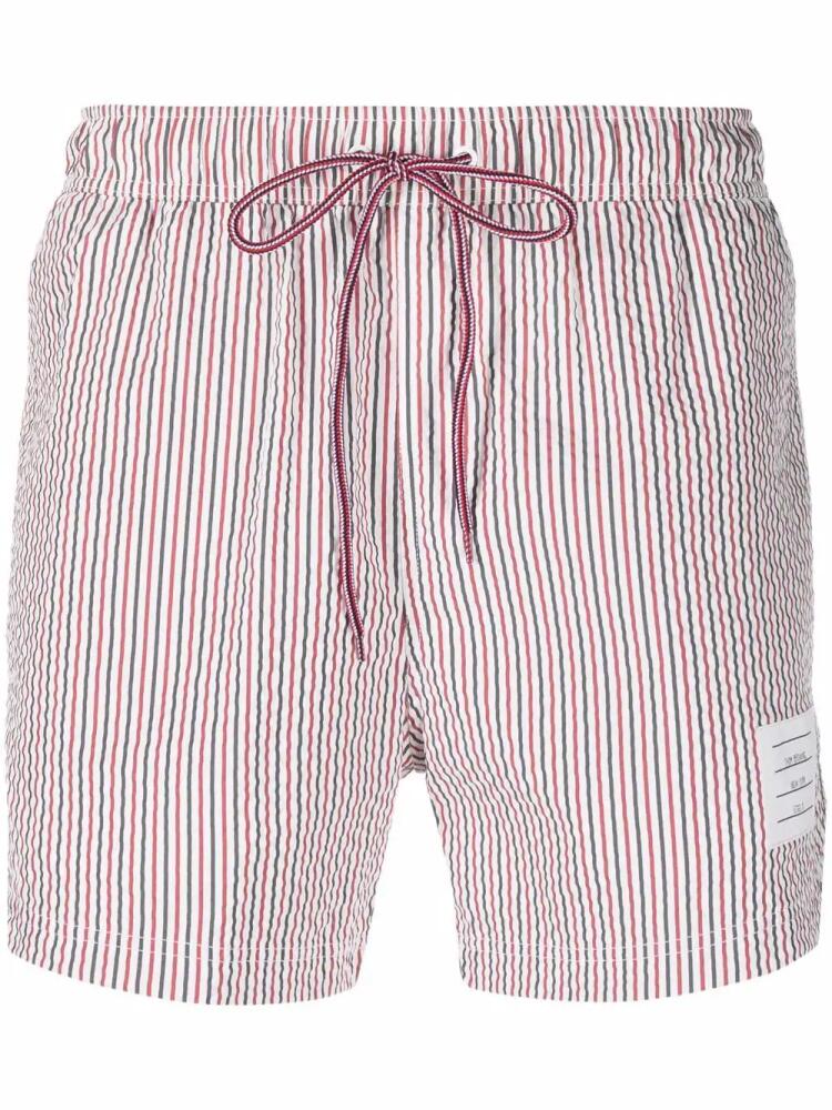 Thom Browne seersucker logo-patch swim shorts - Red Cover