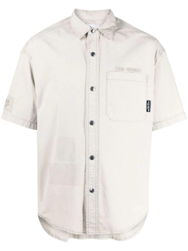 izzue embroidered-logo stretch-cotton shirt - Neutrals Cover